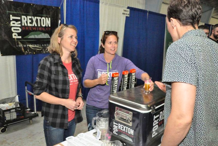 Port Rexton Brewing Co. owners Sonja Mills (left) and Alicia MacDonald were among 40 North American and European breweries represented at the Craft Beer Attraction this weekend at the St. John’s Curling Club. The Port Rexton team were debuting a new barrel-aged version of their Mixed Opportunity saison.