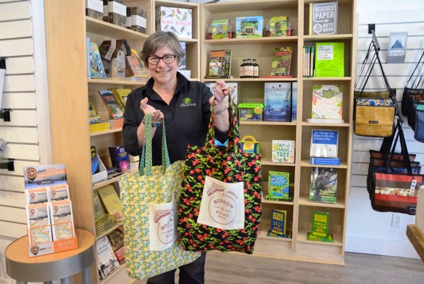 Darlene Payne displays two of more than 200 boomerang bags being used by businesses in St. John’s. A group called Boomerang Bags – Avalon Peninsula hopes to get more of the reusable bags made so more stores can use them, reducing plastic bag usage. 