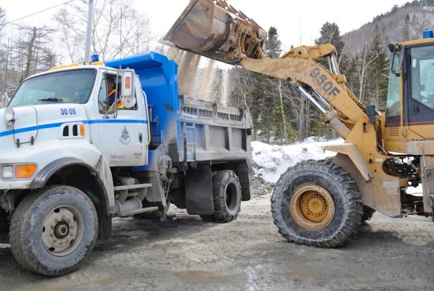 Road salt is loaded onto a truck at the City of Corner Brook’s works depot on Charles Street. Salt spread on roads gives motorists traction, but it also eats away at their vehicles.