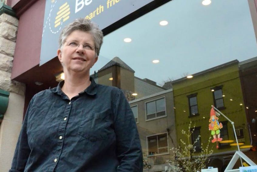 Peg Norman, co-owner of The Bee’s Knees, stands in front of the new store on Water Street in St. John’s.
