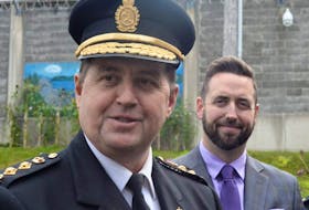 Owen Brophy (left), superintendent of prisons for Newfoundland and Labrador, and Minister of Justice and Public Safety Andrew Parsons speak to reporters at Her Majesty’s Penitentiary on Wednesday.