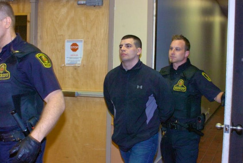 Justin Michael Jordan (a.k.a. Hussey) is led into provincial court in St. John’s Thursday afternoon, a day after being arrested for allegedly stabbing another man.