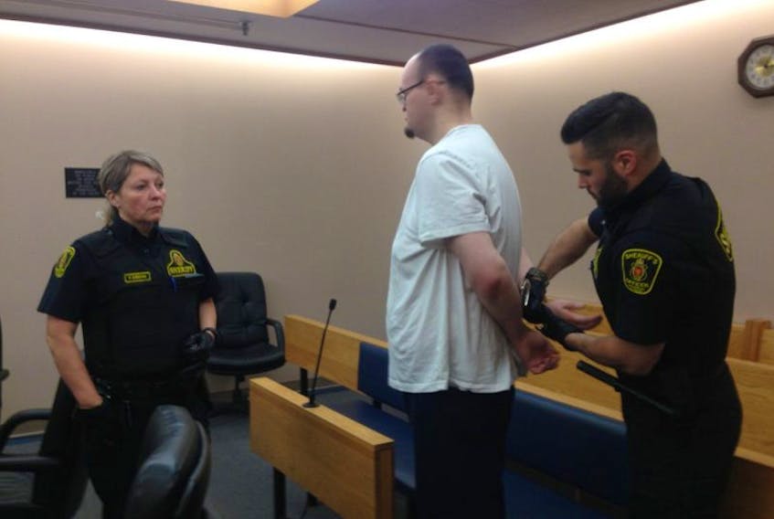 Matthew Douglas Twyne, 31, is taken back into custody after his sentencing hearing in provincial court in St. John’s Monday afternoon. Twyne pleaded guilty to exposing himself to teenage dance students attending a class at a Lemarchant Road dance studio in May.