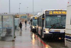 Buses filled up quickly at The Avalon Mall on early Friday afternoon, as people hurried to escape a messy mix of rain and blowing snow. 