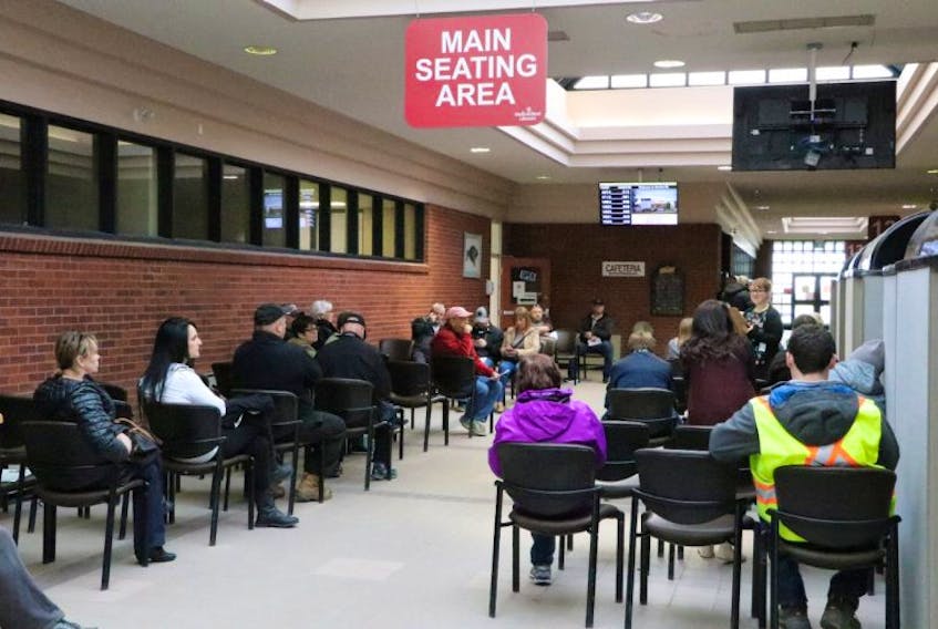 The waiting area at the Motor Registration Division in Mount Pearl is still busy, but new digital service options help move clients through the system much faster.