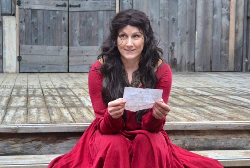 This photo of Janet Edmonds as Lady MacBeth, taken during Perchance Theatre’s 2015 season, is on a plaque, unveiled Saturday, that adorns the entrance to the open-air theatre in Cupids.