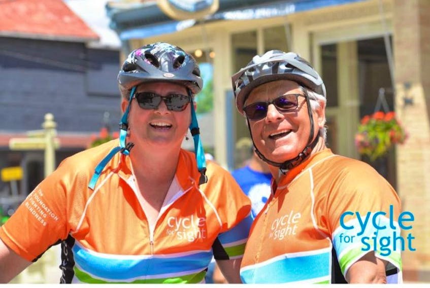 Husband and wife Amy Kavanagh-Penney and Lawrence Penney at Cycle for Sight in Toronto.