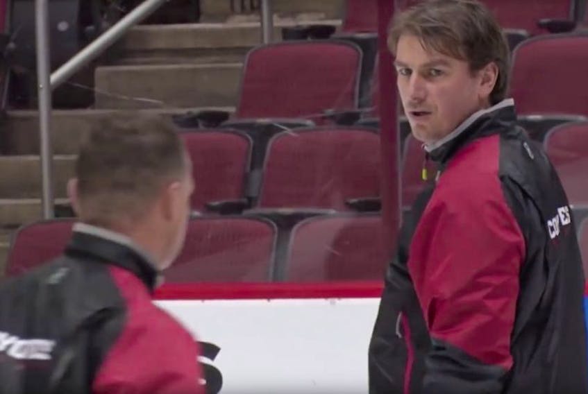 John Slaney, shown during a practice session with the NHL’s Arizona Coyotes, has been named an assistant coach with the Coyotes’ AHL farm team, the Tucson Roadrunners. Slaney had been an assistant coach with Arizona the last two seasons, but his new job means he’ll get to work more directly with players.