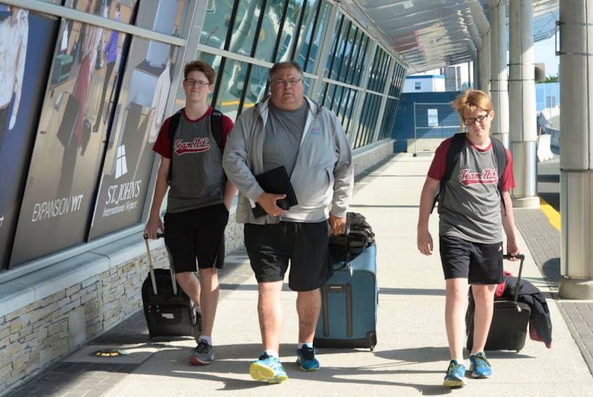 Rowing is one of the first-half sports at the 2017 Canada Summer Games in Winnipeg and Newfoundland and Labrador’s team includes Mark Power, 16 (left) and Zachary Power, 14, flanking their dad and Team NL rowing coach Paul Power.