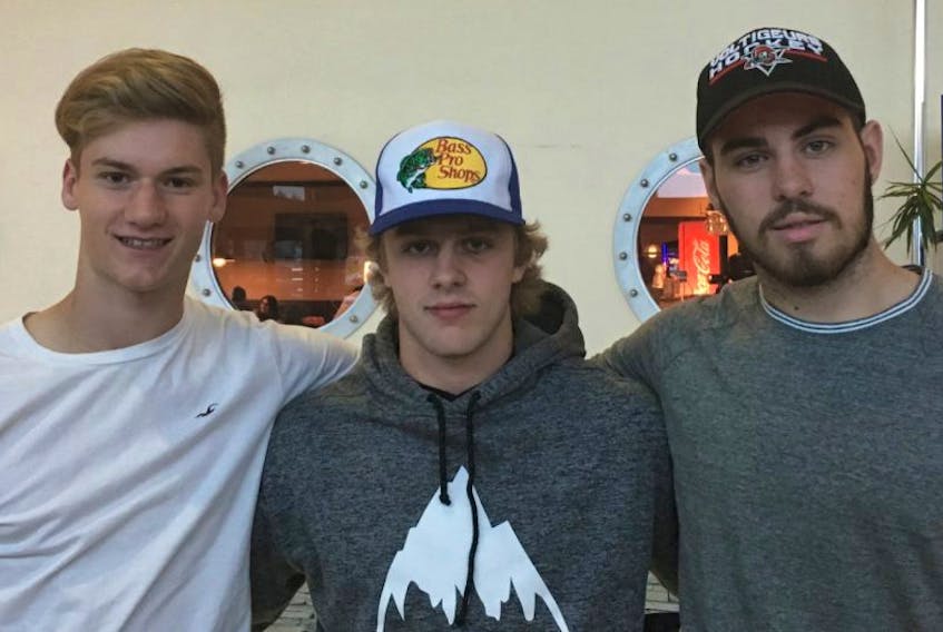 Cousins Dawson Mercer (left) and Zack Bennett (right), who have made the QMJHL’s Drummondville Voltigeurs as rookies, flank fellow Bay Roberts native Kyle Petten, a first-year forward with the Halifax Mooseheads