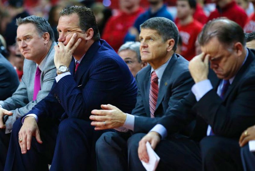 Jeff Dunlap, left, the former North Carolina State Wolfpack director of basketball operations, will become the first head coach in St. John’s franchise history in the National Basketball League of Canada, The Telegram has learned. Dunlap, shown in this NC State file photo, is seated next to then-Wolfpack head coach Mark Gottfried, associate coach Bobby Lutz and assistant coach Rob Moxley.