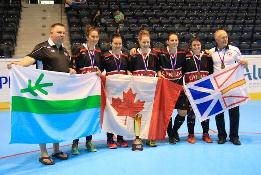 There was certainly a big Newfoundland and Labrador contingent for the women’s world ball hockey championship Saturday in Pardubice, Czech Republic. Team Canada featured five players and the manager from this province, while Steve Power of St. John’s, who is president of the Canadian Ball Hockey Association, was on hand for the tournament. Shown holding the Labrador, Canadian and provincial flags  are (from left) Power, players Chloe Tinkler of Wabush, April Drake of St. John’s, Dawn Tulk of Port Saunders, Amanda Kean of St. Anthony, Kristen Cooze of Kippens and manager Tom Walsh of Clarenville. Cooze was named the top defender of the world championship.

