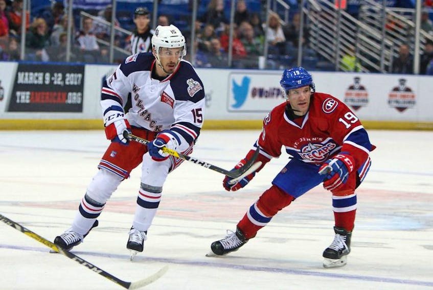 Forward Bobby Farnham (19), shown in action against Marek Hrivik (15) and the Hartford Wolf Pack in an AHL game in Hartford, Conn., earlier this season, is the latest player to be recalled to the Montreal Canadiens from the St. John’s IceCaps.