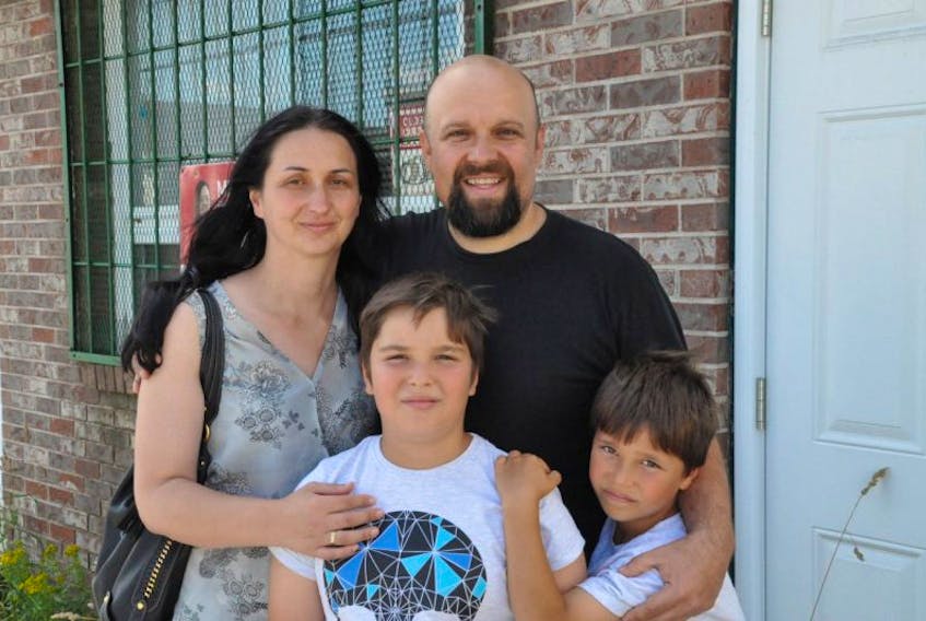Husband and wife Eldin Husic (right) and Adnela Halebic-Husic, along with their boys Mehmed-Mesha (left) and Tarik recently moved to St. John’s and have purchased the former Sports Bar on Boncloddy Street, where they hope to open an ethnic restaurant serving Balkan cuisine using recipes from their native Bosnia and Herzegovina.