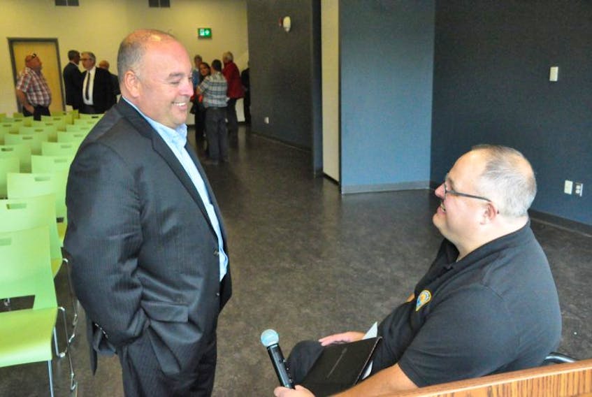 Conception Bay South mayor-elect Terry French (left) speaks with Conception Bay Area Chamber of Commerce executive director John Smith following a meet-and-greet with municipal election candidates on Tuesday. Both say the need for growth in the town’s business community is key for expanding the tax base.
