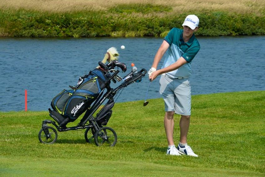 Nathan Young of the host Clovelly Club chips onto the 10th green during the Gatorade Junior Masters, the Tely Junior Golf Tour event held at the St. John’s golf course on Tuesday. It was the final event before the Tour Championship, to be held next week at Terra Nova.
