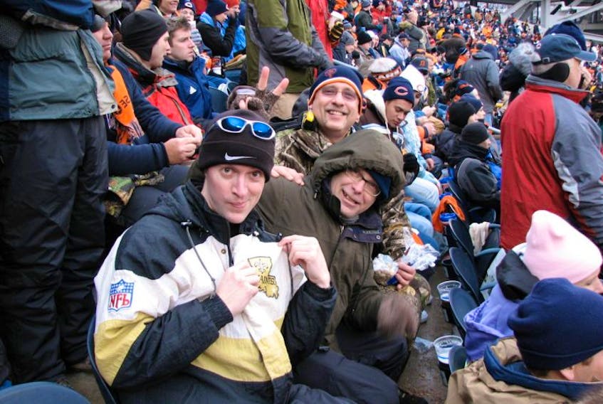 Jonathan Clarke of Corner Brook proudly shows off his New Orleans Saints colours during the 2006 NFL Championship game, played between the Saints and Chicago Bears on Jan. 21, 2007 at Soldier Field in Chicago. To his left sitting next to Clarke are the two Bears season-ticket holders who sold Clarke a ticket for the game — for $100 less than he offered.