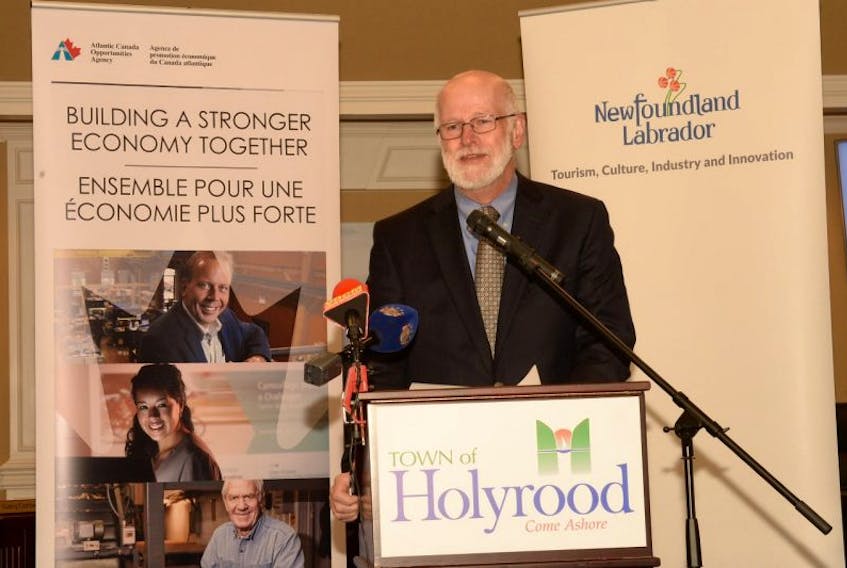 Randy Earle, treasurer and board of directors member with the Holyrood Marina Park Corp. in the Conception Bay town, speaks about the benefits of the federal/provincial funding announcement for the marina that took place Wednesday at the Holyrood Town Hall.