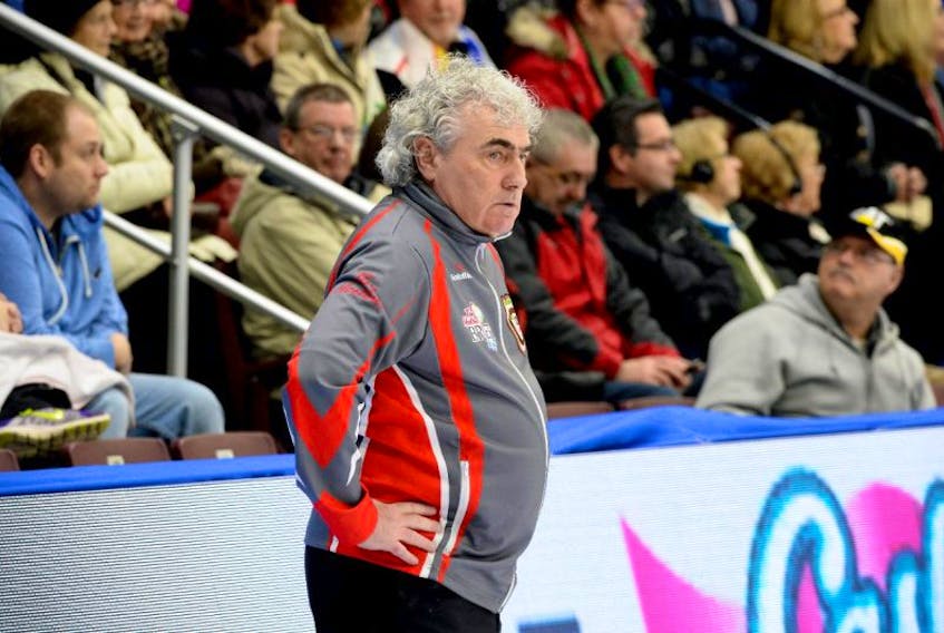 Northwest Territories coach Terry Shea keeps an eye on the rink’s morning draw against Team Newfoundland and Labrador Tuesday at the Tim Hortons Brier 2017. The native of Harbour Grace got his start as a player, but eventually turned to coaching and developed a passion for the intricacies of icemaking.
