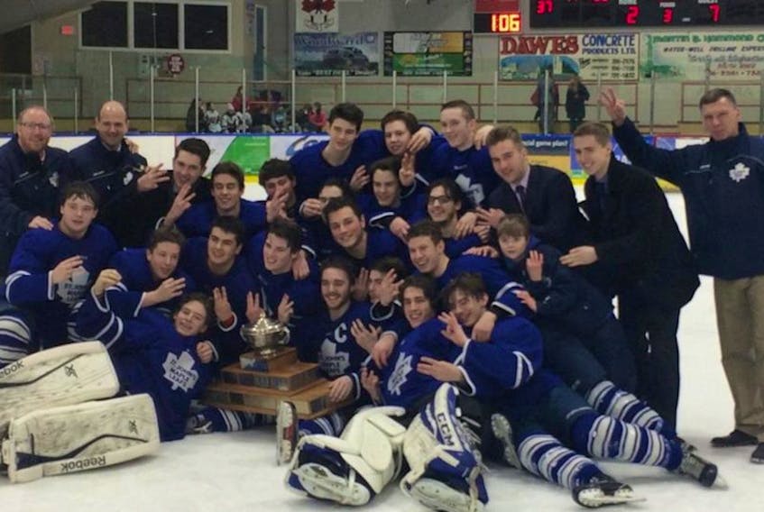 Members of the St. John’s Maple Leafs celebrate their third straight provincial major midget hockey championship Saturday in Bay Roberts after a 7-2 win over the Tri-Pen Osprey. The Leafs took the best-of-seven final in four games