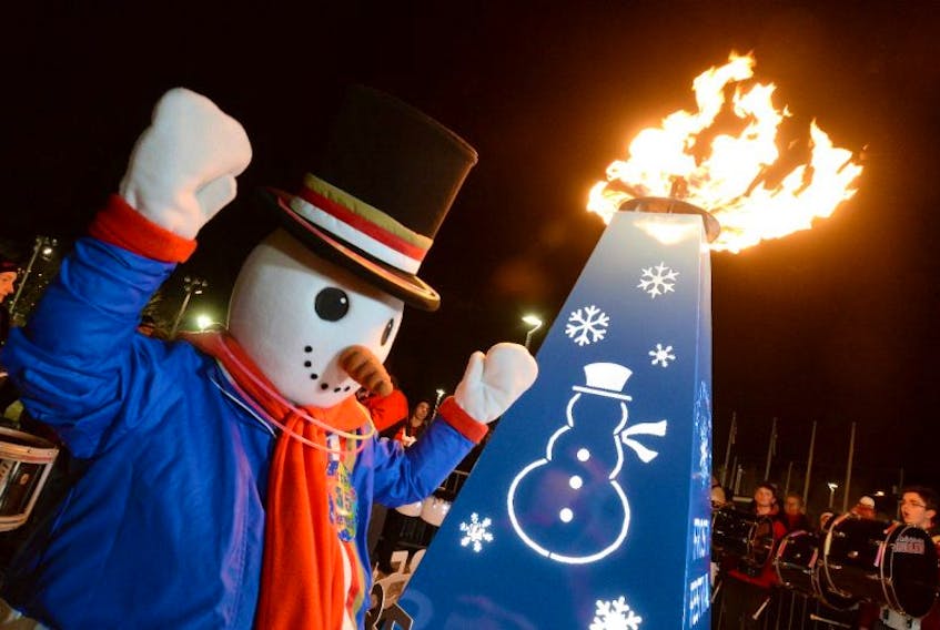 Frosty, the mascot for the Mount Pearl Frosty Festival, celebrates during the opening ceremonies of the annual event. 