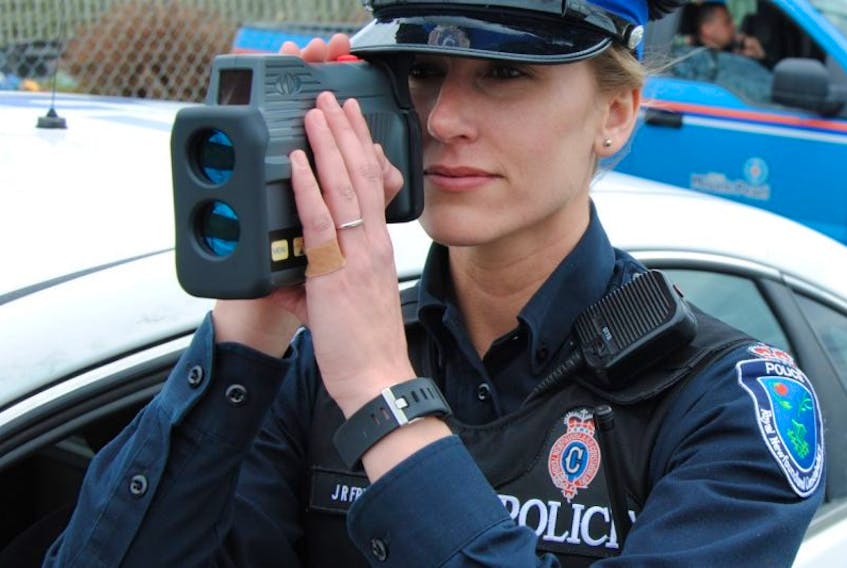 RNC Const. Jenna Fry-Day uses a LIDAR, a light detection and ranging gun used to calculate a vehicle's speed.