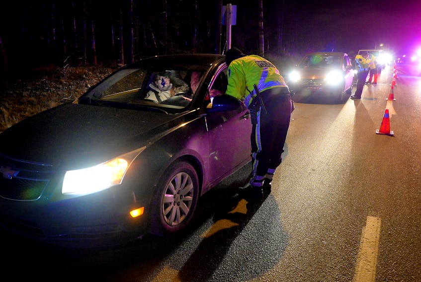 The RNC conducted a roadside checkpoint Wednesday night in the town of Torbay. Keith Gosse/The Telegram