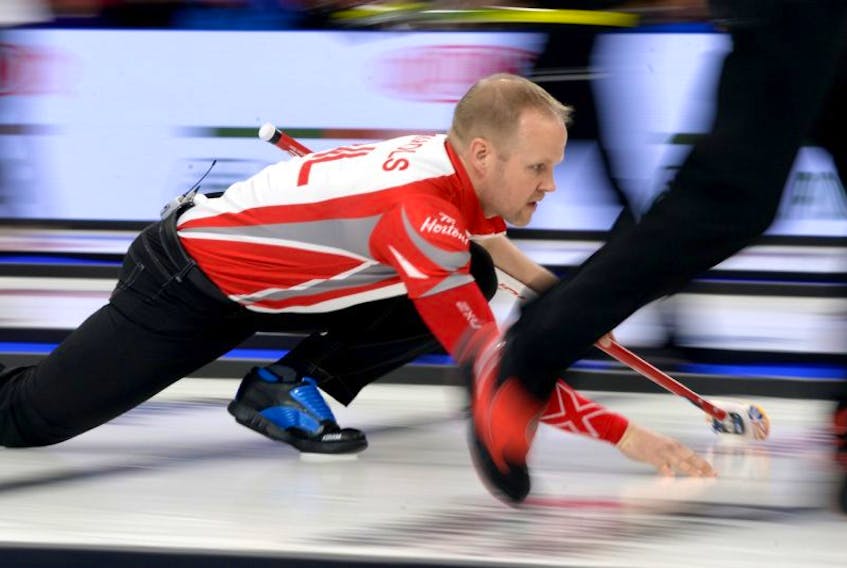 Newfoundland and Labrador's Mark Nichols watches his rock during a draw at the Brier at Mile One Centre.

Keith Gosse/The Telegram