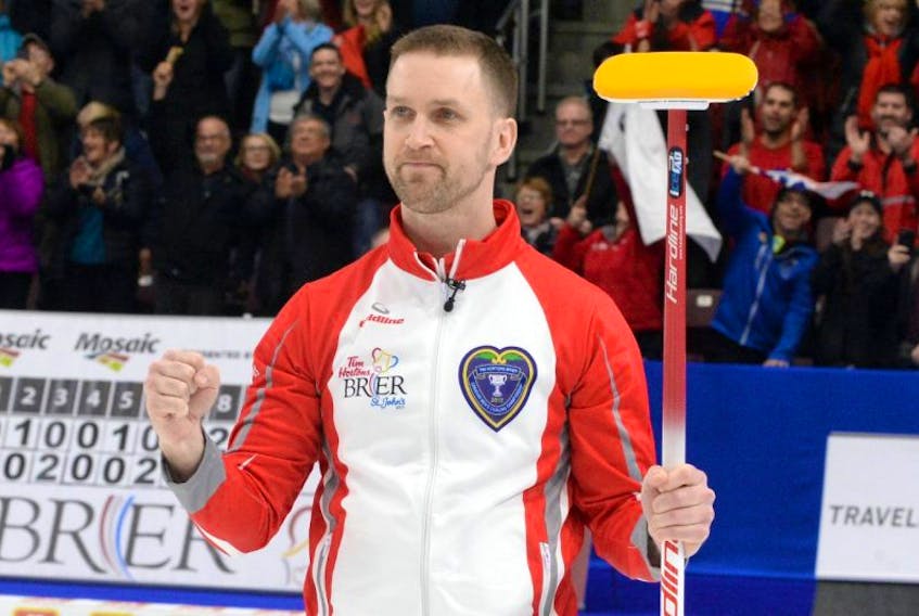 Newfoundland and Labrador skip Brad Gushue celebrates his team's win during the Thursday night draw of the Brier at Mile One Centre. Team Newfoundland and Labrador won the game 7-6 in the eleventh end over team Canada.

