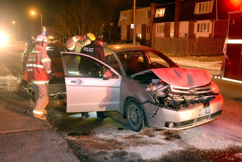 Two parked cars on Doyle Street were damaged Saturday night after they were struck by a third westbound vehicle. 