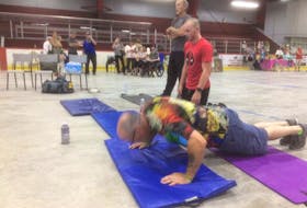 Bill Guiney was doing pushups so quickly on Saturday that he was little more than a blur as his team members waited their turn at the Southern Shore Arena.
