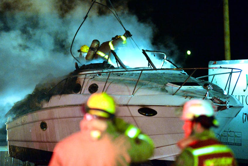 A boat was extensively damaged in an early morning St. John's Fire Friday. Keith Gosse/The Telegram