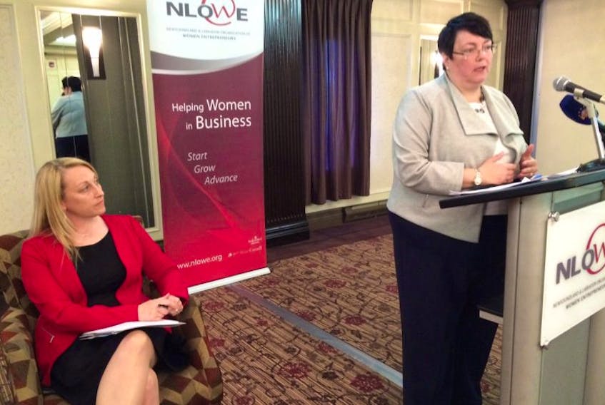 Newfoundland and Labrador Organization of Women Entrepreneurs (NLOWE) CEO Paula Sheppard looks on as Finance Minister Cathy Bennett speaks at the release Wednesday of Unleashing the Potential of Women: An Economic Action Plan for Newfoundland and Labrador.