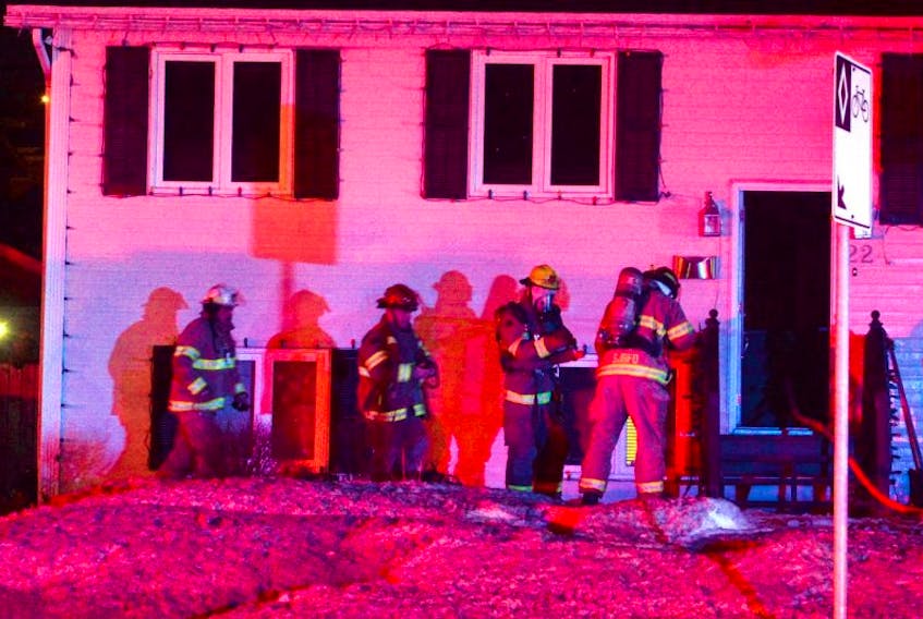 A house fire on Canada Drive forced five people and a family dog out into the cold early Sunday morning. 