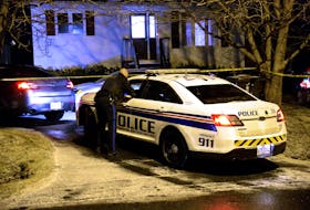 Police hold the scene of an apparent murder-suicide in Conception Bay South Saturday night. Keith Gosse/The Telegram