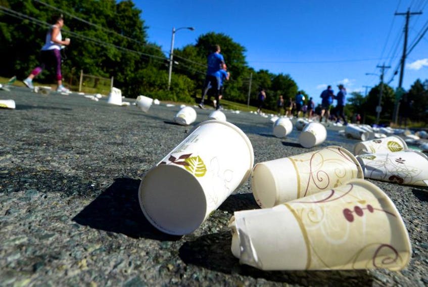 Empty beverage cups lie on the pavement during Tely 10 road race in St. John's. Pedatricians say kids and teens should avoid energy drinks.