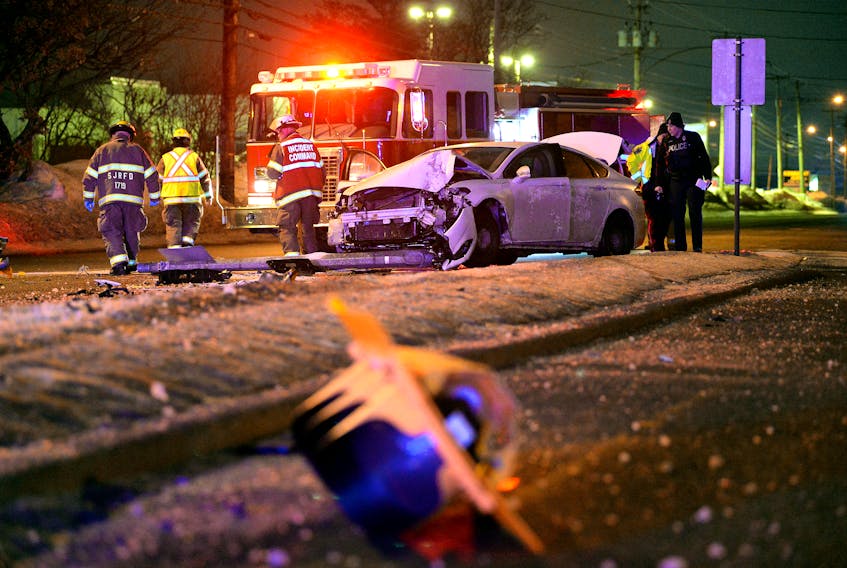 A man was sent to hospital after the car he was driving collided with a traffic light on Kenmount Road early Thursday morning. Keith Gosse/The Telegram