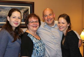 Paradise mayor Dan Bobbett is all smiles as he celebrates his second term with his family, daughter Alicia (left), wife Valerie and daughter Amanda (right) and their home Tuesday night following the 2017 municipal election.