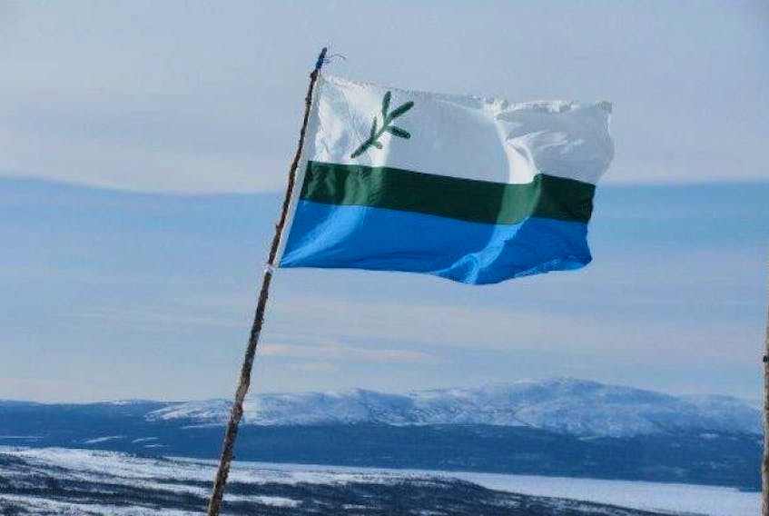 Jodi Greenleaves shared this photo of a Labrador flag that belonged to her late great-uncle, Burton Lethbridge of Paradise River, Labrador. The photo was taken atop Mount McKay on Earl Island by her father, John Martin of Cartwright. “It is a family heirloom, and one of great pride, which will undoubtedly be passed on again when the time comes,” Greenleaves said.