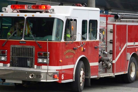 A St. John's Regional Fire Department truck is shown.