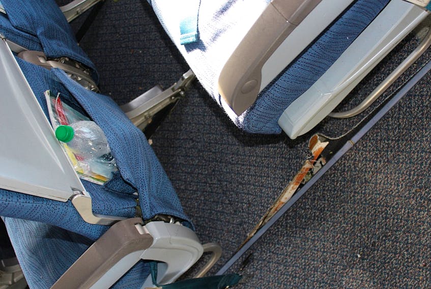 Floor damage aboard Air Canada flight 624, which severed power lines, then struck the ground about 740 feet before the runway and proceeded to slide down the runway on March 29, 2015.