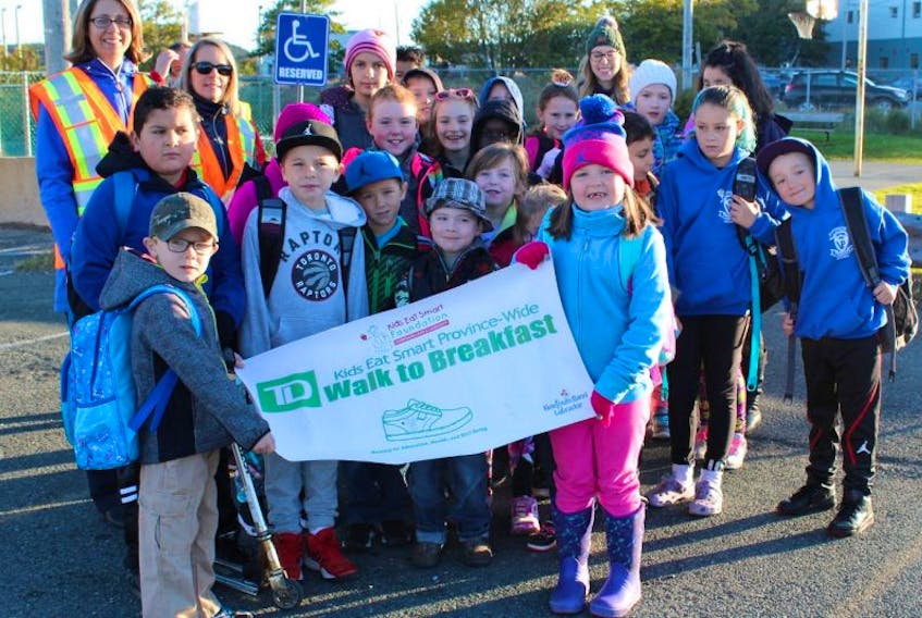 Students and teachers from East Point Elementary School in St. John’s prepare to set off the TD Walk to Breakfast Wednesday morning.