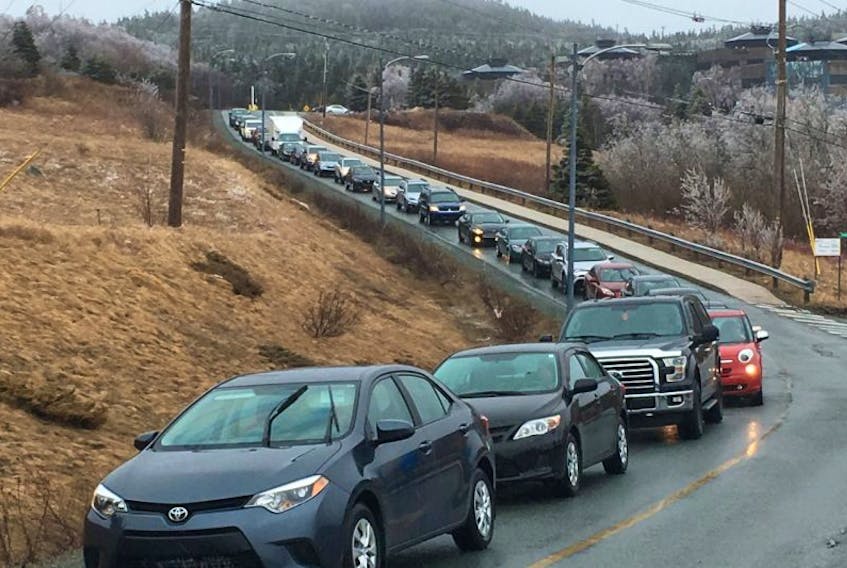 Cars were backed up as employees tried to leave the Department of Fisheries and Oceans headquarters in St. John's Friday afternoon after demonstrators blocked the main exit. Demonstrators were there in support of fisherman Richard Gillett, who's staging a hunger strike near the entrance to protest what he sees as mismanagement of  fish stocks.