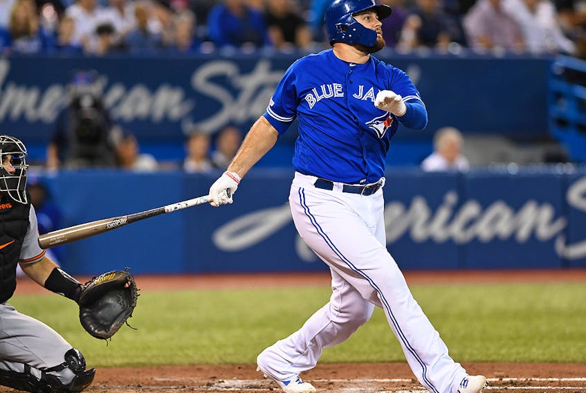 Toronto Blue Jays first baseman Rowdy Tellez  hits a home run against the Baltimore Orioles in the fourth inning at the Rogers Centre in Toronto on Wednesday, Sept. 25, 2019. 