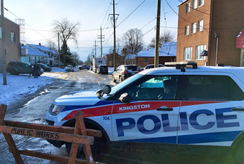 Police block off a street Friday morning during an RCMP national security investigation in Kingston, Ont. on Jan. 25, 2019. 