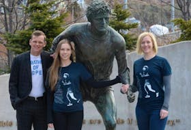Darrell Fox, younger brother of Terry Fox, his daughter Alexandra (left) and his niece Kirsten Fox stand at the Terry Fox monument in downtown St. John’s in April 2019. SaltWire Network file photo