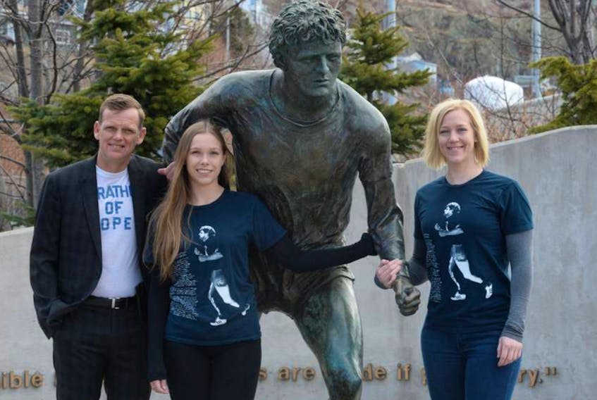 Darrell Fox, younger brother of Terry Fox, his daughter Alexandra (left) and his niece Kirsten Fox stand at the Terry Fox monument in downtown St. John’s in April 2019. SaltWire Network file photo