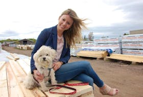 Jillian Sexton and her dog, Bo, have become a fixture lately at the former Sherwood BMR in Charlottetown. Sexton hopes to make the struggling building materials store a success as Sherwood Timber Mart.