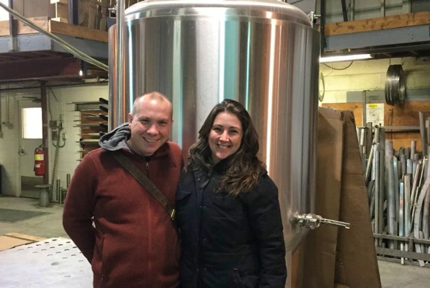 ['Ken Spears and Ashley Condon are pictured at DME Brewing while shopping for a brewhouse recently. ']