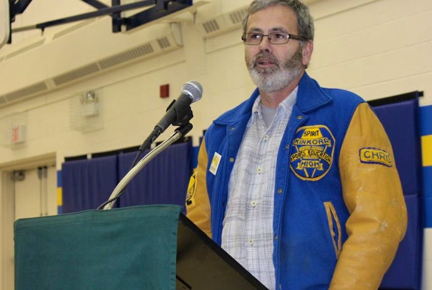 Chris McCardle, a KRHS alumnus, donned his letterman jacket for his presentation at the public school review feedback meeting in Kinkora on